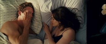Movie still from “Definitely, Maybe” (2008), directed by Adam Brooks – A man and a woman laying in a bed; Close Up shot, Overhead angle