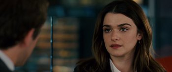 Movie still from “Definitely, Maybe” (2008), directed by Adam Brooks – A person with long hair; Close Up shot, Over the shoulder angle