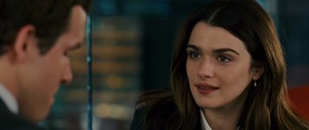 Movie still from “Definitely, Maybe” (2008), directed by Adam Brooks – A person with long hair; Close Up shot, Over the shoulder angle