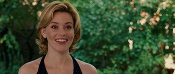 Movie still from “Definitely, Maybe” (2008), directed by Adam Brooks – A person with short blonde hair; Close Up shot, Over the shoulder angle