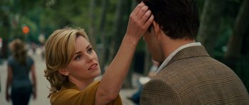Movie still from “Definitely, Maybe” (2008), directed by Adam Brooks – A woman touching a man's head with her hand; Close Up shot, Over the shoulder angle