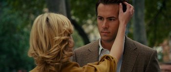 Movie still from “Definitely, Maybe” (2008), directed by Adam Brooks – A man and a woman looking at one another; Close Up shot, Over the shoulder angle