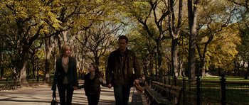 Movie still from “Definitely, Maybe” (2008), directed by Adam Brooks – A man and a child walking down a sidewalk; Wide shot, Over the shoulder angle