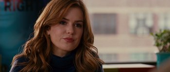 Movie still from “Definitely, Maybe” (2008), directed by Adam Brooks – A person with long red hair; Close Up shot, Over the shoulder angle