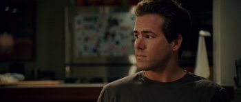 Movie still from “Definitely, Maybe” (2008), directed by Adam Brooks – A person looking at something; Close Up shot, Over the shoulder angle