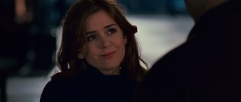 Movie still from “Definitely, Maybe” (2008), directed by Adam Brooks – A person wearing a black jacket; Close Up shot, Over the shoulder angle