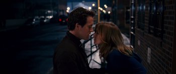 Movie still from “Definitely, Maybe” (2008), directed by Adam Brooks – A man and a woman standing next to each other on a sidewalk; Close Up shot, Over the shoulder angle
