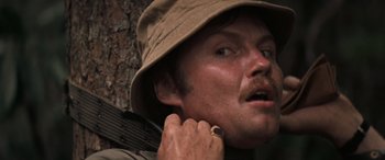 Movie still from “Deliverance” (1972), directed by John Boorman – A person wearing a hat; Close Up shot, Low angle