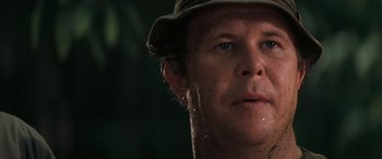 Movie still from “Deliverance” (1972), directed by John Boorman – A person wearing a hat and looking at the camera; Close Up shot, Low angle