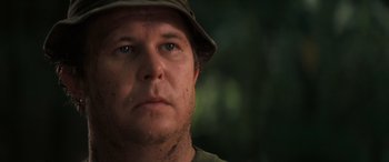 Movie still from “Deliverance” (1972), directed by John Boorman – A person wearing a hat; Close Up shot, Low angle