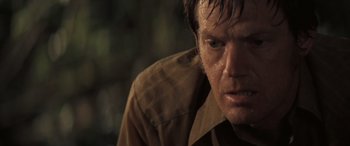 Movie still from “Deliverance” (1972), directed by John Boorman – A person with wet hair; Close Up shot, Low angle