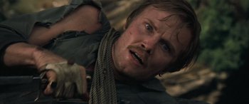 Movie still from “Deliverance” (1972), directed by John Boorman – A person with a rope around his neck; Close Up shot, Overhead angle