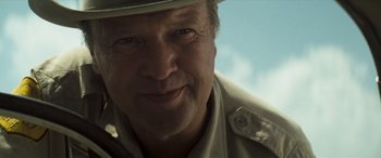 Movie still from “Deliverance” (1972), directed by John Boorman – A man wearing a hat; Close Up shot, Low angle