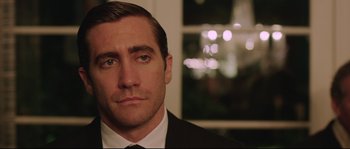 Movie still from “Demolition” (2015), directed by Jean-Marc Vallée – A person wearing a suit and tie; Close Up shot, Over the shoulder angle