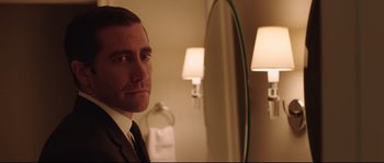 Movie still from “Demolition” (2015), directed by Jean-Marc Vallée – A person wearing a suit and tie; Close Up shot, Over the shoulder angle