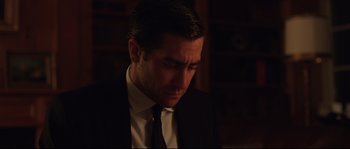 Movie still from “Demolition” (2015), directed by Jean-Marc Vallée – A person wearing a suit and tie; Close Up shot, Over the shoulder angle