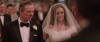 Movie still from “Demolition” (2015), directed by Jean-Marc Vallée – A man and a woman in wedding attire and a veil; Close Up shot, Over the shoulder angle
