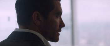 Movie still from “Demolition” (2015), directed by Jean-Marc Vallée – A person wearing a suit and tie; Close Up shot, Over the shoulder angle