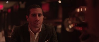 Movie still from “Demolition” (2015), directed by Jean-Marc Vallée – A person wearing a suit and tie; Close Up shot, Over the shoulder angle