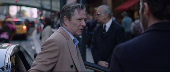 Movie still from “Demolition” (2015), directed by Jean-Marc Vallée – A person wearing a suit and a tie; Close Up shot, Over the shoulder angle