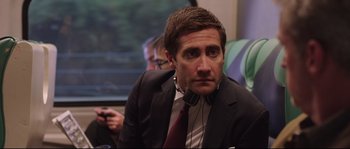 Movie still from “Demolition” (2015), directed by Jean-Marc Vallée – A person wearing a suit and tie; Close Up shot, Over the shoulder angle