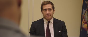 Movie still from “Demolition” (2015), directed by Jean-Marc Vallée – A person wearing a suit and tie; Close Up shot, Over the shoulder angle