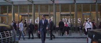 Movie still from “Demolition” (2015), directed by Jean-Marc Vallée – A group of people walking down a sidewalk; Wide shot, Low angle