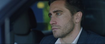 Movie still from “Demolition” (2015), directed by Jean-Marc Vallée – A person wearing a suit and tie; Close Up shot, Over the shoulder angle