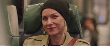 Movie still from “Demolition” (2015), directed by Jean-Marc Vallée – A person wearing a jacket and a hat; Close Up shot, Over the shoulder angle