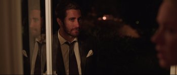 Movie still from “Demolition” (2015), directed by Jean-Marc Vallée – A person wearing a suit and tie; Close Up shot, Over the shoulder angle