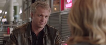 Movie still from “Demolition” (2015), directed by Jean-Marc Vallée – A man sitting at a table in front of a woman; Close Up shot, Over the shoulder angle