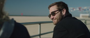 Movie still from “Demolition” (2015), directed by Jean-Marc Vallée – A person wearing a suit and sunglasses; Close Up shot, Over the shoulder angle