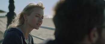 Movie still from “Demolition” (2015), directed by Jean-Marc Vallée – A woman with blonde hair is talking to a man; Close Up shot, Over the shoulder angle