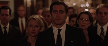 Movie still from “Demolition” (2015), directed by Jean-Marc Vallée – A person wearing a suit and tie; Close Up shot, Low angle