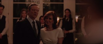 Movie still from “Demolition” (2015), directed by Jean-Marc Vallée – A man and a woman standing next to each other in a room; Medium shot, Over the shoulder angle