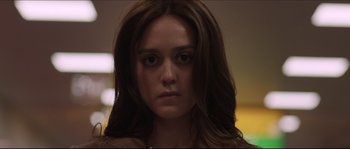 Movie still from “Demolition” (2015), directed by Jean-Marc Vallée – A person with long brown hair; Close Up shot, Over the shoulder angle