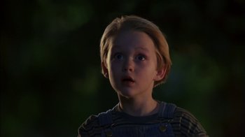 Movie still from “Dennis the Menace” (1993), directed by Nick Castle – A little boy with a surprised look on his face; Close Up shot, Low angle