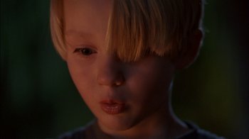 Movie still from “Dennis the Menace” (1993), directed by Nick Castle – A child with a nose piercing; Close Up shot, High angle