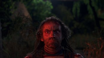 Movie still from “Dennis the Menace” (1993), directed by Nick Castle – A person with long dreadlocks; Close Up shot, Low angle