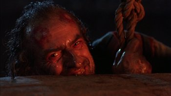 Movie still from “Dennis the Menace” (1993), directed by Nick Castle – A person with blood on his face; Close Up shot, Low angle