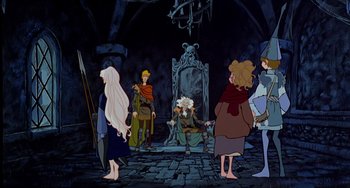 Movie still from “The Last Unicorn” (1982), directed by Jules Bass – A group of people standing in a room; Wide shot, High angle