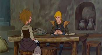 Movie still from “The Last Unicorn” (1982), directed by Jules Bass – An animated scene of a man and woman sitting at a table; Medium shot, Over the shoulder angle