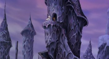 Movie still from “The Last Unicorn” (1982), directed by Jules Bass – A painting of a mountain with a cave on it; Extreme Wide shot, Low angle