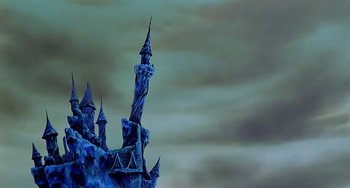 Movie still from “The Last Unicorn” (1982), directed by Jules Bass – A castle like structure in the middle of the night sky; Extreme Wide shot, Low angle