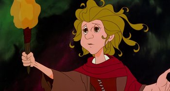 Movie still from “The Last Unicorn” (1982), directed by Jules Bass – A cartoon character with a red cape; Close Up shot, Low angle