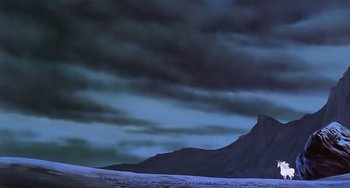 Movie still from “The Last Unicorn” (1982), directed by Jules Bass – A painting of a mountain with a dark sky above it; Extreme Wide shot, Low angle