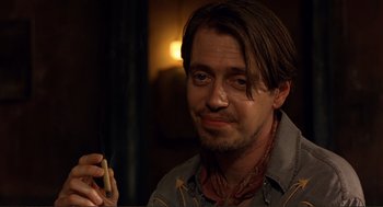 Movie still from “Desperado” (1995), directed by Robert Rodriguez – A person holding a cell phone; Close Up shot, Low angle