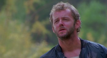 Movie still from “Desperate Hours” (1990), directed by Michael Cimino – A person wearing a jacket; Close Up shot, Low angle