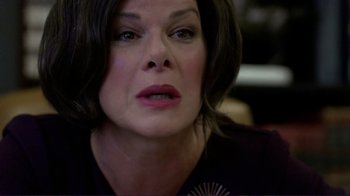 Movie still from “Detachment” (2011), directed by Tony Kaye – A person with short black hair; Close Up shot, Over the shoulder angle