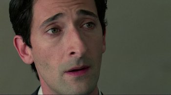 Movie still from “Detachment” (2011), directed by Tony Kaye – A man's face with green eyes; Close Up shot, High angle